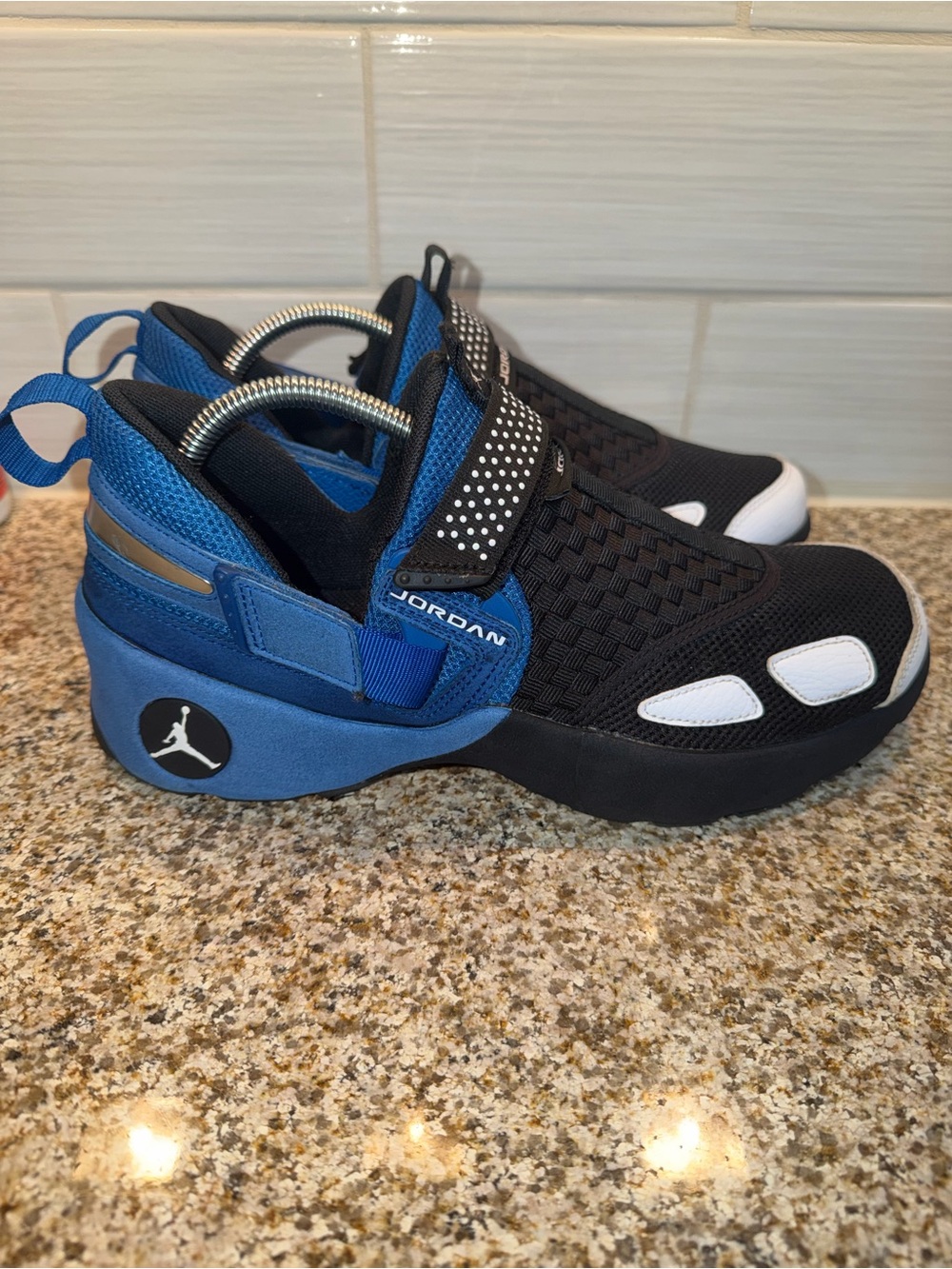 Jordan Men’s Black and Blue Slip-On Athletic Sneakers